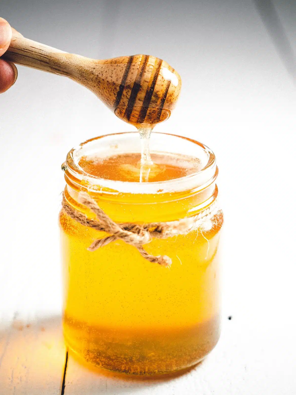 honey in a glass jar.